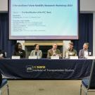 Panelists on stage at the 2024 3Revolutions Workshop
